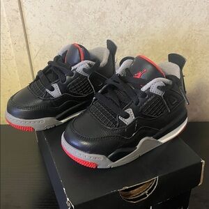 Retro Jordan 4 Black and Gray Sneakers with Red Details